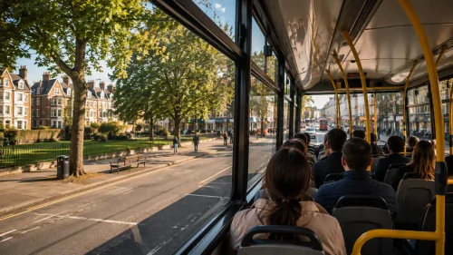 Passengers travelling on a modern London bus through South London neighbourhoods.